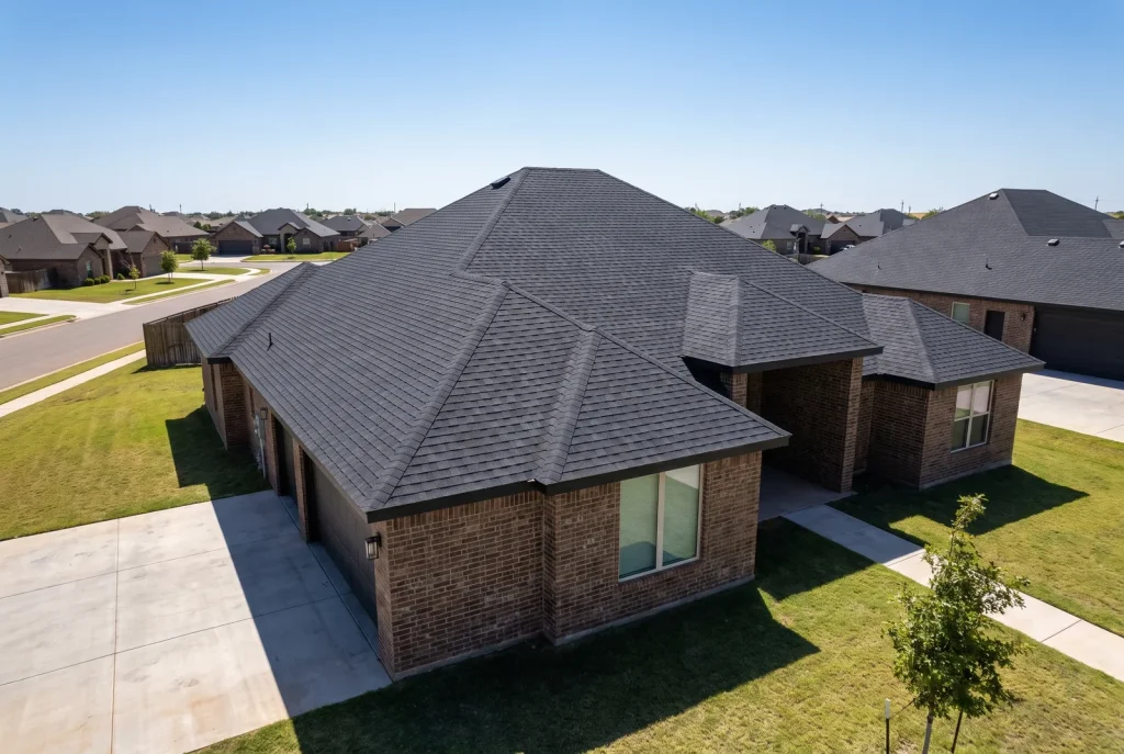 Newly installed hail-resistant shingle roof on a Lubbock home ready for West Texas storm season